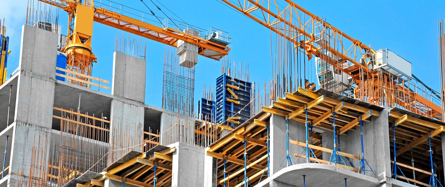 Image showing a crane and building construction site against blue sky